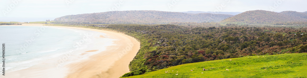 Summer Family Activity, walking to Sandfly Bay to observe wildlife and panoramic views of of the sand dunes, coastal beach and farmlands in Otago Peninsula region, Dunedin, South Island, New Zealand.