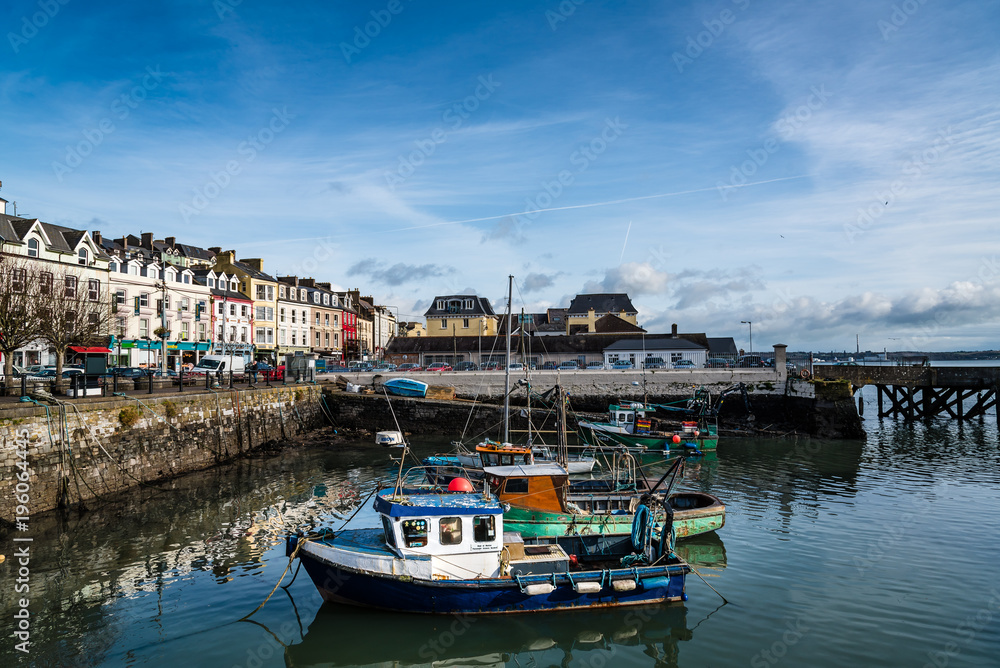 Waterfront and harbour with fishing boats in Ireland