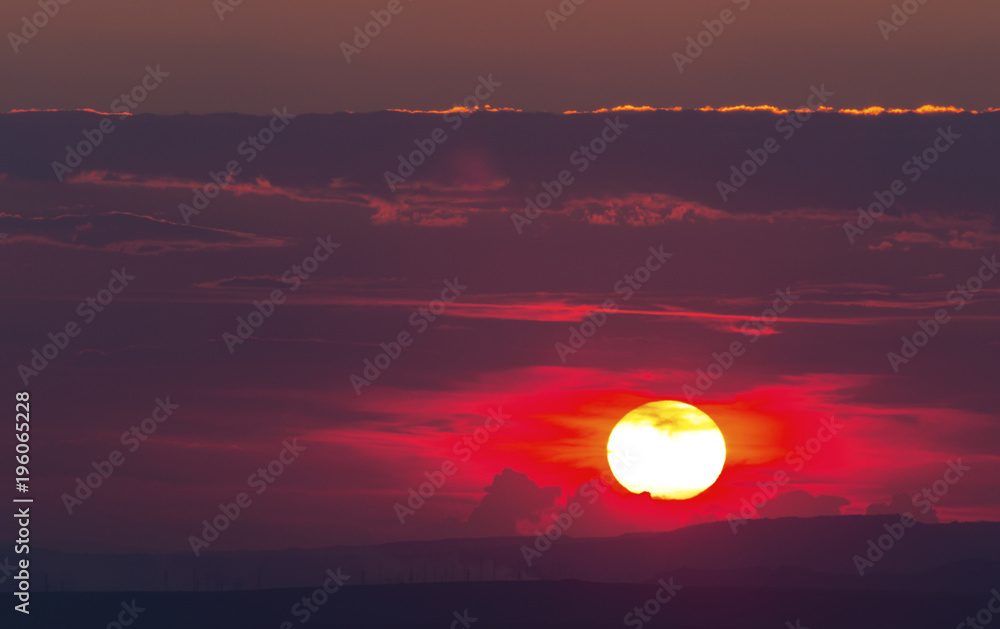 Beautiful sunset with colorful clouds on the sky Beautiful sunset with colorful clouds on the sky