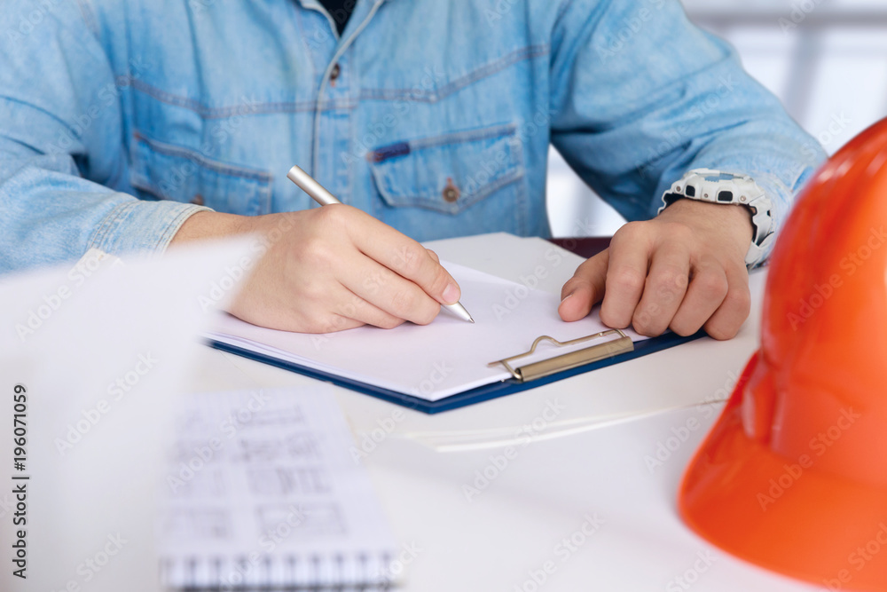 Construction engineer develops a construction plan . Construction engineer develops a construction plan .