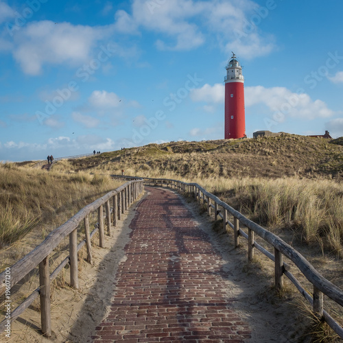 Old lighthouse on the beach of De Cocksdorp in the Netherlands