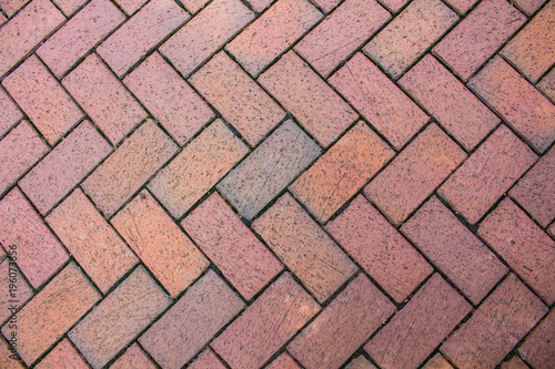 A brick angled sidewalk for a patterned background.