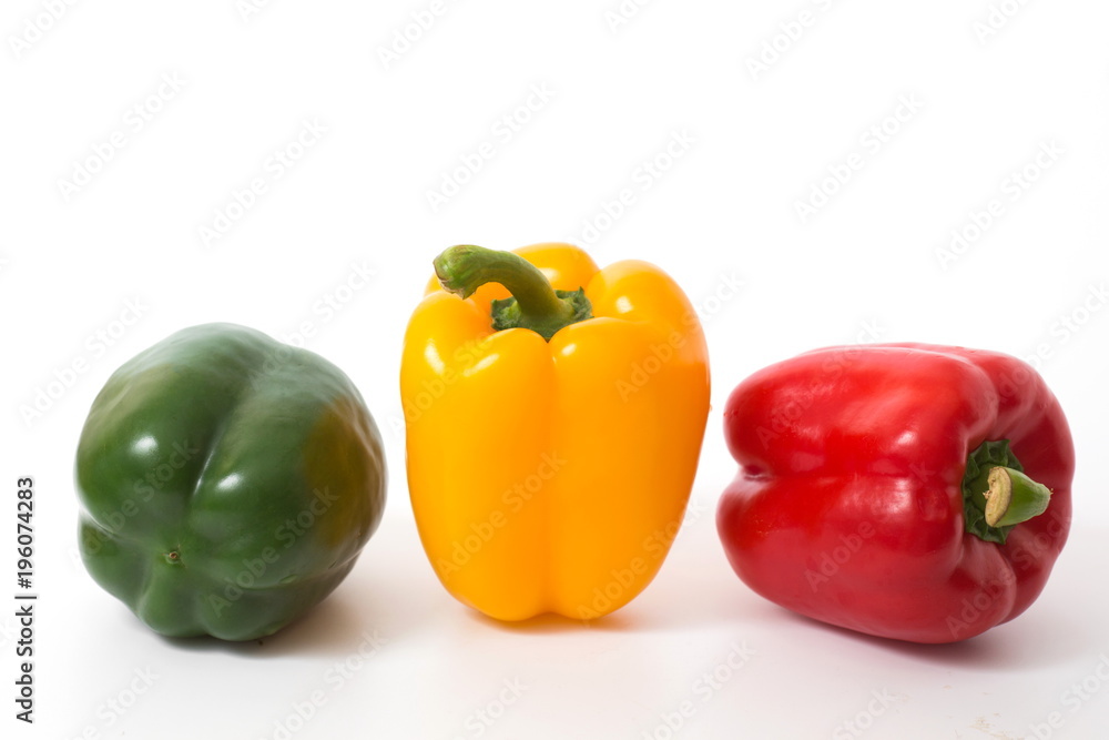 Fresh vegetables sweet red,yellow and green pepper isolated on white background. Fresh vegetables sweet red,yellow and green pepper isolated on white background.