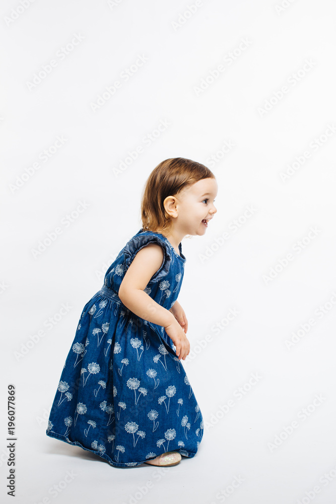 Profile portrait of a cute little preschool girl on white background Profile portrait of a cute little preschool girl on white background