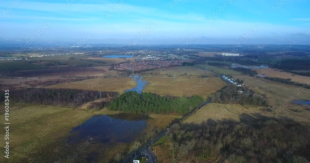 Aerial view looking over the Seven Lochs Wetland Park towards Gartcosh near Glasgow, Scotland. Aerial view looking over the Seven Lochs Wetland Park towards Gartcosh near Glasgow, Scotland.