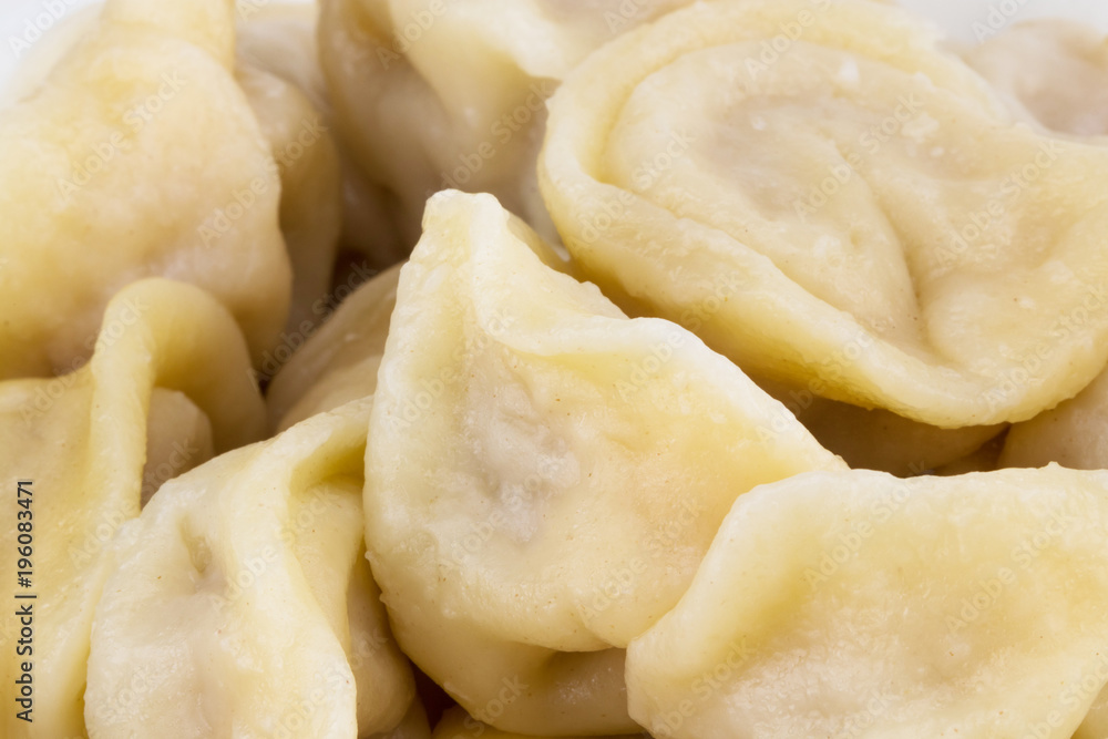 Russian meat Dumplings Pelmeni in bowl. Сlose up