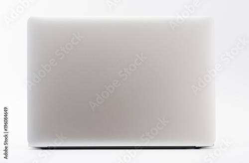 Modern new laptop on white background, back view