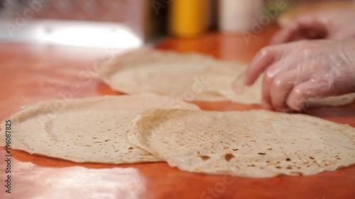 Chef puts on the table pancakes photo