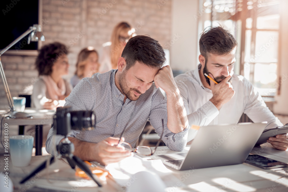 Business people in modern office. Business people in modern office.