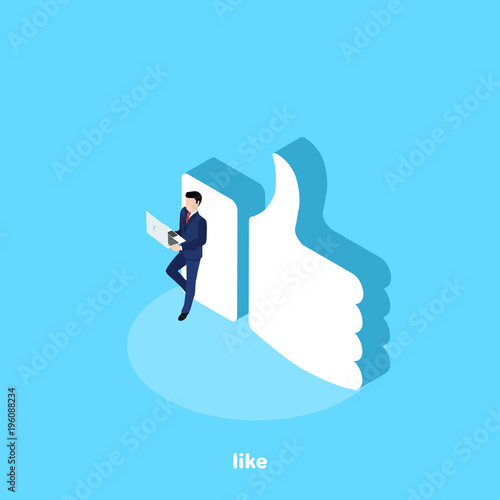 a man in a business suit with a laptop stands near a large like icon , an isometric image