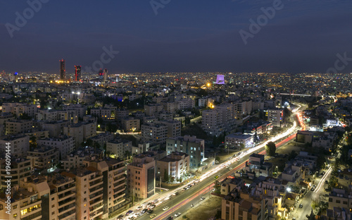 view of Amman's new downtown and abdoun bridge at night