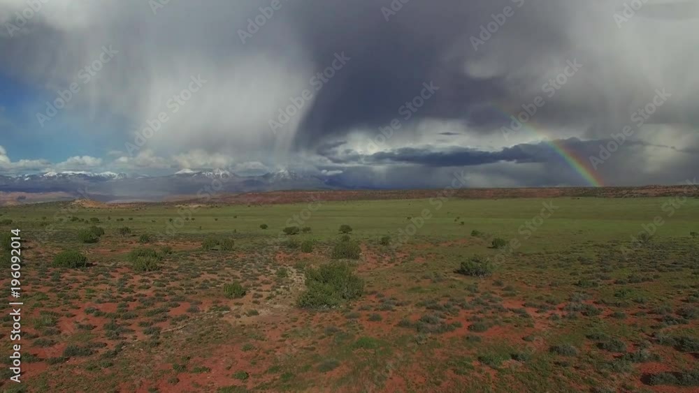 Flying Low Over Field Towards Epic Rainbow and Storm Flying Low Over Field Towards Epic Rainbow and Storm