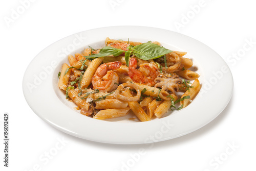 pasta with prawns seafood in a plate on a white background