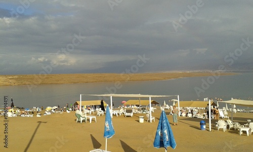 Watching a storm role in from the Palestinian beach on the Dead Sea © Tenley