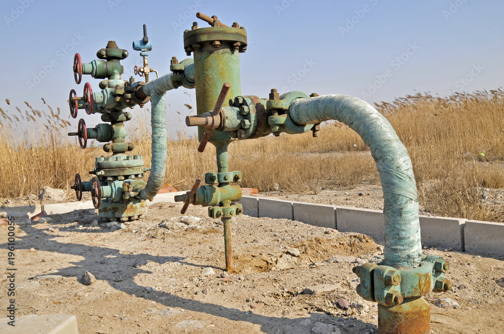 The oil drill pipes and valves The oil drill pipes and valves