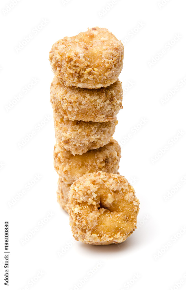 Small Coconut Donuts on a White Background Small Coconut Donuts on a White Background