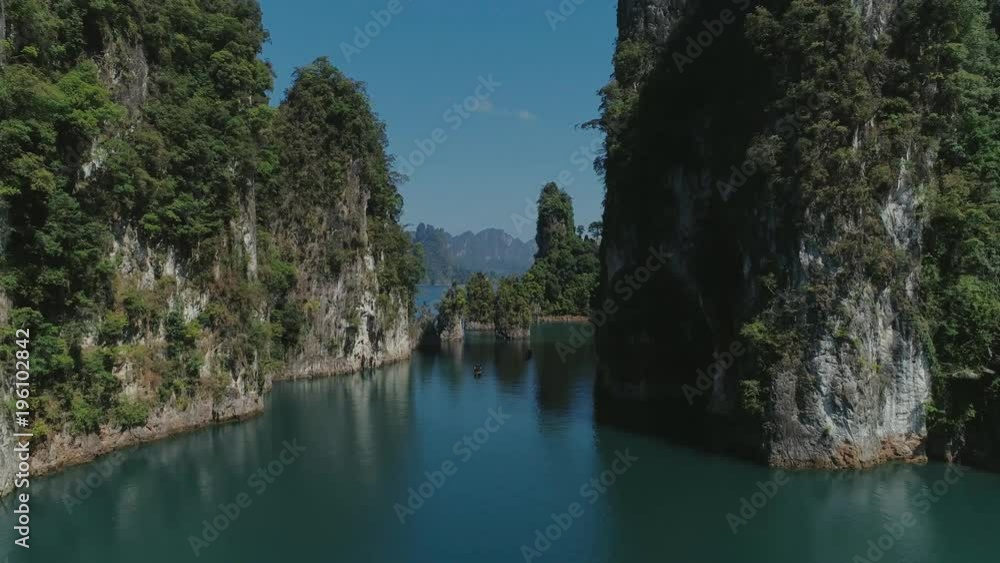 Tropical Thai jungle lake Cheo lan drone flight, wild mountains nature national park ship yacht Tropical Thai jungle lake Cheo lan drone flight, wild mountains nature national park ship yacht