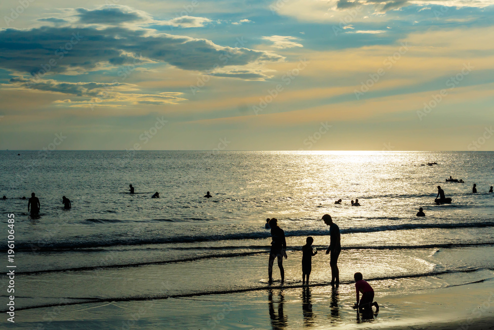 Fototapeta premium Beach on sunny day. Young boys and girl enjoying a summer day in tropical paradise for travel