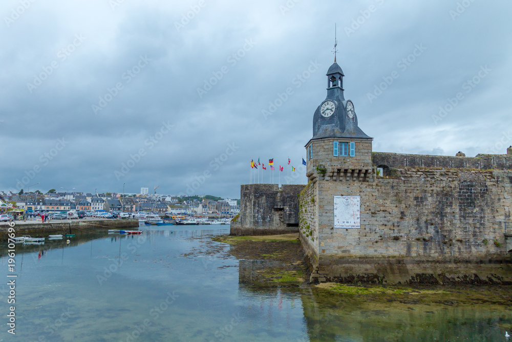 Concarneau, Brittany, France. The walls and tower of old part of medieval town situated on an island.