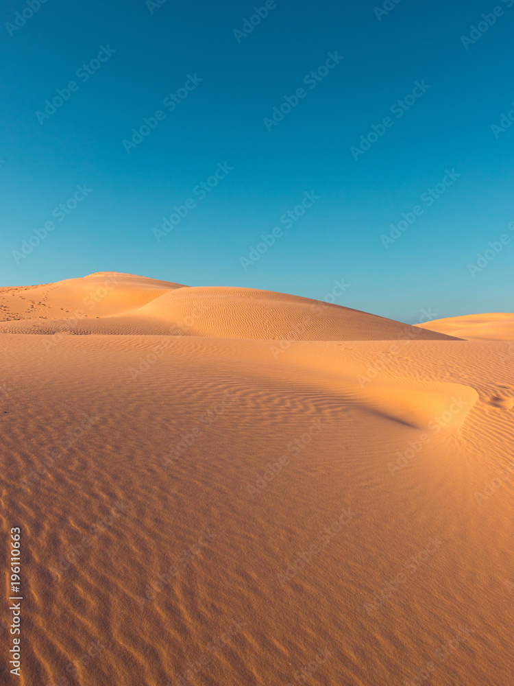 Empty desert view with clear blue sky. Empty desert view with clear blue sky.
