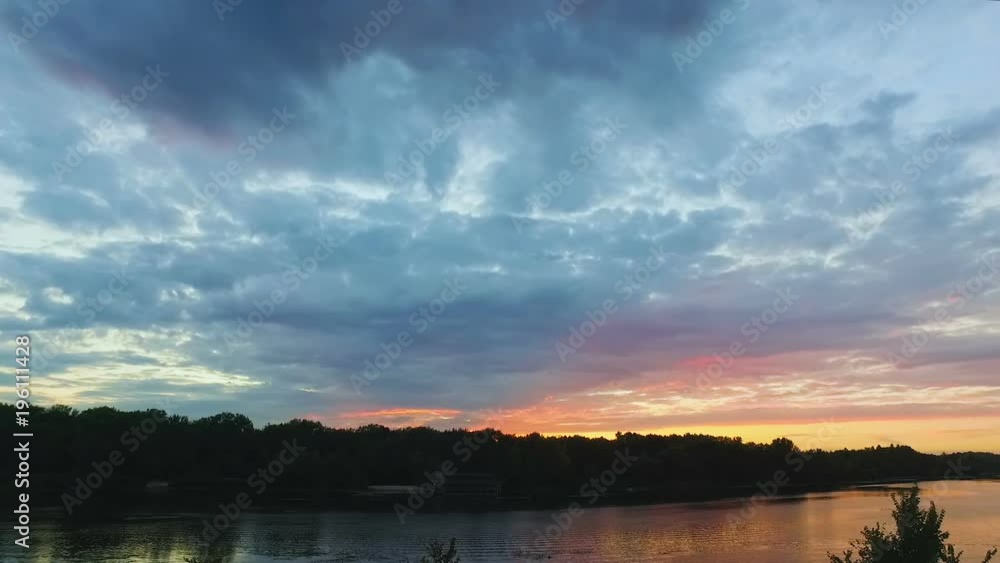 View of beautiful sunset reflecting in clean surface of river, relaxing nature View of beautiful sunset reflecting in clean surface of river, relaxing nature