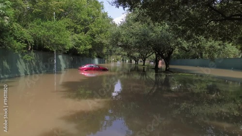 Aerial view of flooded cars on street after Hurricane Harvey photo