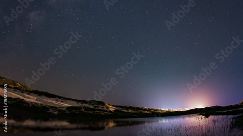 Time lapse - Stars over 'Joaquina's' dunes and lagoons. Florianópolis, Santa Catarina / Brazil photo