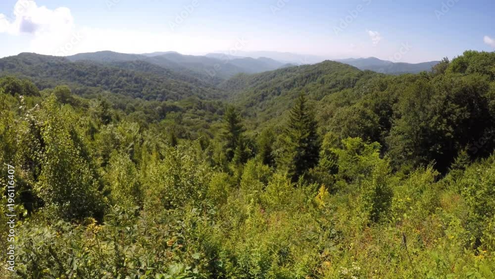 Mountain ranges and valleys of Great Smoky Mountains National Park with blue haze in summer breeze in North Carolina, USA
