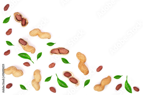 Peanuts with leaves isolated on white background with copy space for your text, top view. Flat lay pattern