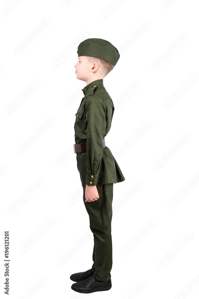 child boy in uniform military standing sideways and looking in front, in front of white background child boy in uniform military standing sideways and looking in front, in front of white background