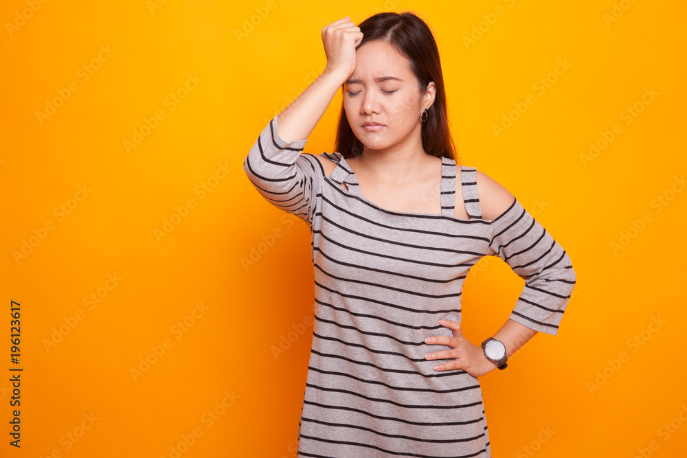 Young Asian woman got sick and headache. Young Asian woman got sick and headache.