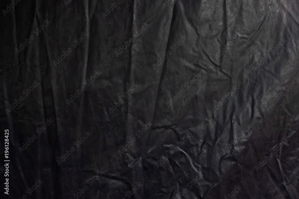 Fototapeta premium Wrinkles on rubber blanket for covering things on trucks. Abstract background.