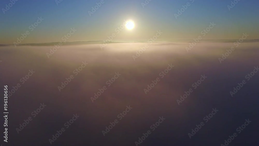 Epic Soaring Low And Fast Over Clouds at Sunrise. Epic Soaring Low And Fast Over Clouds at Sunrise.