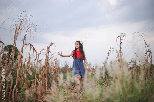 Asian cute girl is holding flowet bouquet Beauty Romantic Girl Outdoors. photo