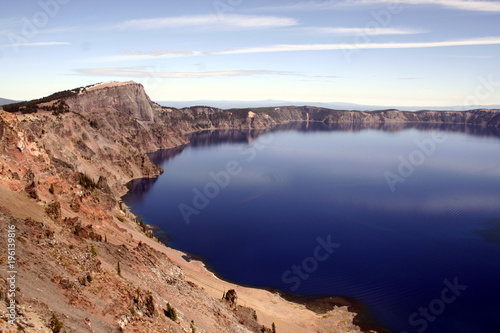 A view of the blue water of Crater Lake in the Crater Lake National Park in a sunny day  Oregon  USA