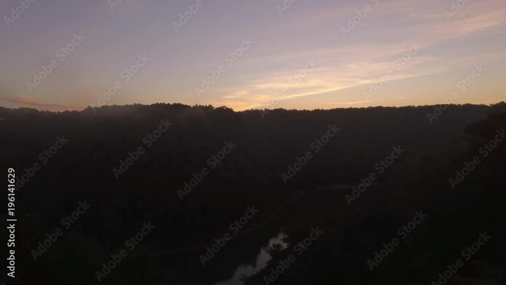 Mysterious Forested Canyon and River at Dawn Mysterious Forested Canyon and River at Dawn
