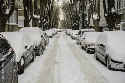 car covered with snow in the street of Varna, Bulgaria.