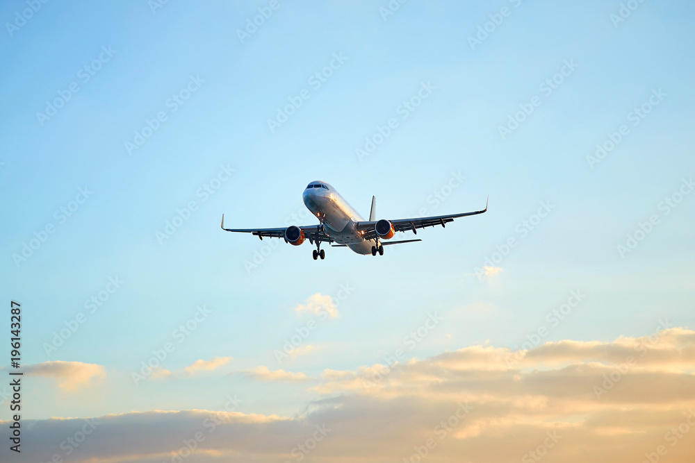 Flying airplain over blue sky Flying airplain over blue sky