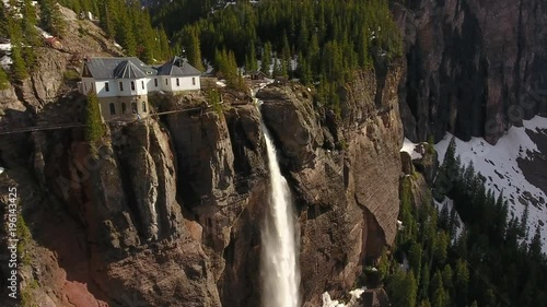 Orbiting House Perched on Gigantic Waterfall in Telluride Colorado