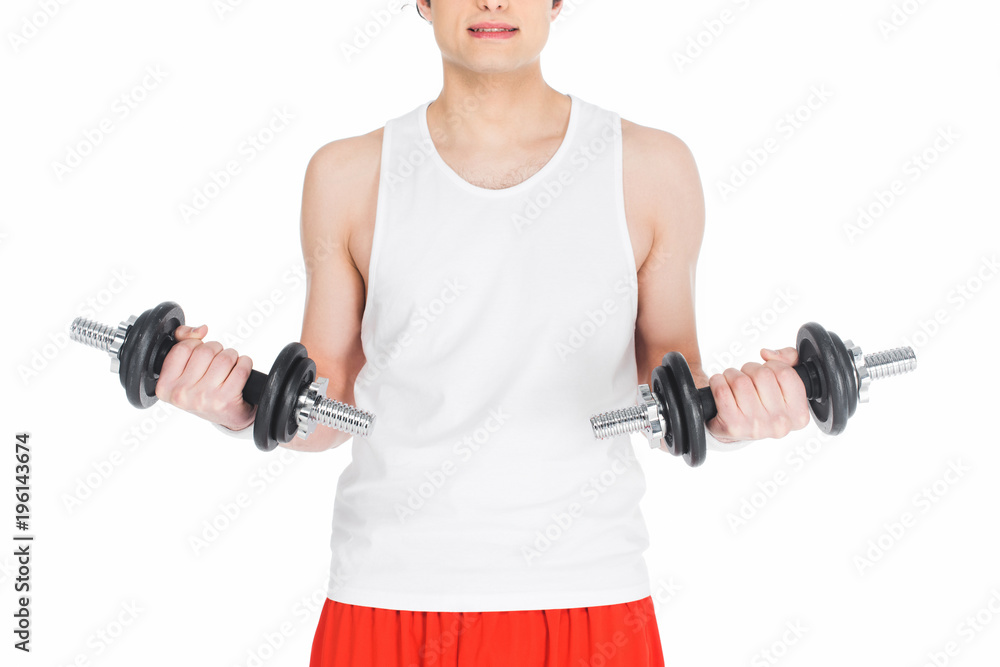 Cropped image of young skinny man holding dumbbells isolated on white Cropped image of young skinny man holding dumbbells isolated on white