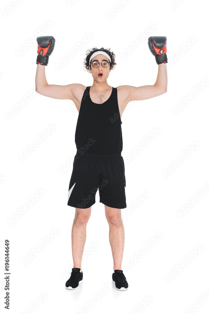 Young thin boxer in eyeglasses standing with arms up isolated onn white Young thin boxer in eyeglasses standing with arms up isolated onn white