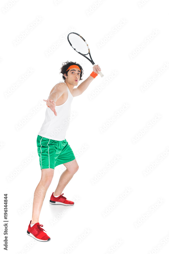 Thin sportsman in headband standing with racket isolated on white Thin sportsman in headband standing with racket isolated on white