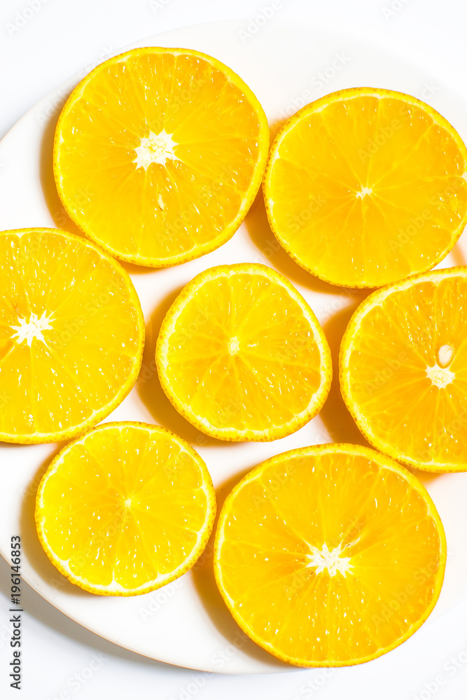 Slices of orange isolated on white background. top view; Slices of orange isolated on white background. top view;