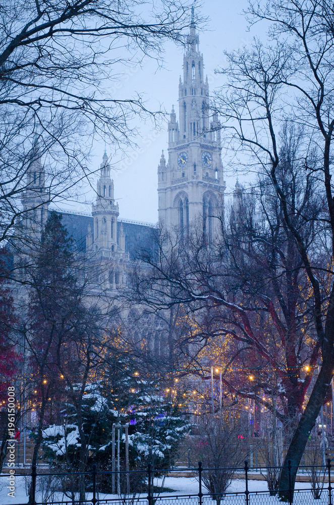 View of the municipal building, das Rathaus, in Vienna during a magical winter evening