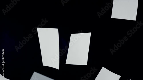 Blank paper sheets falling down