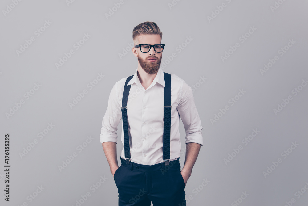 Portrait of sexy stunning handsome attractive cool luxurious strict harsh dreamy groomed sharp dressed focused concentrated elegant blonde guy keeping hands in pockets isolated on gray background Portrait of sexy stunning handsome attractive cool luxurious strict harsh dreamy groomed sharp dressed focused concentrated elegant blonde guy keeping hands in pockets isolated on gray background
