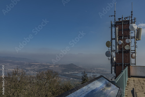 Transmitters on Lovos hill in winter sunny day photo