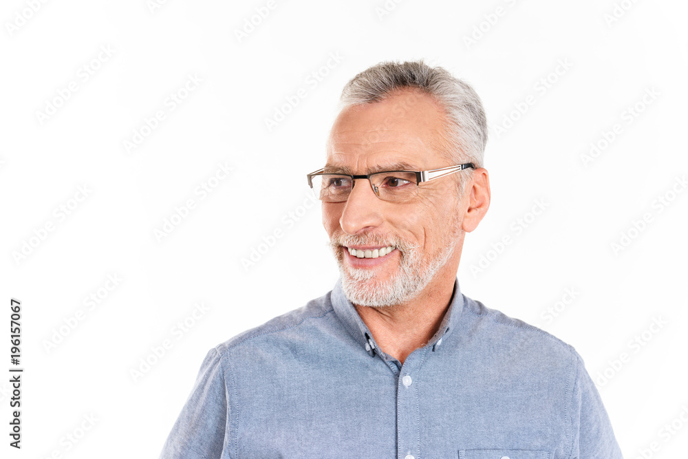 Cheerful happy man looking aside and smiling isolated Cheerful happy man looking aside and smiling isolated