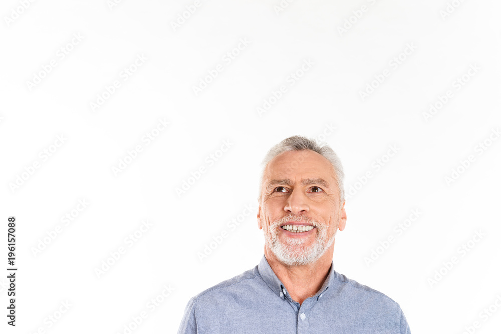 Portrait of pleased man looking up at copy space and smiling isolated Portrait of pleased man looking up at copy space and smiling isolated