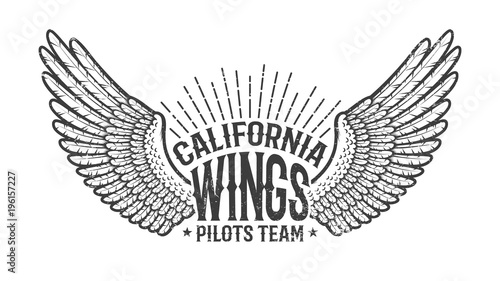 Retro emblem of the club of pilots with outstretched wings. Monochrome on a white background. Worn texture on separate layer and can be easily disabled.